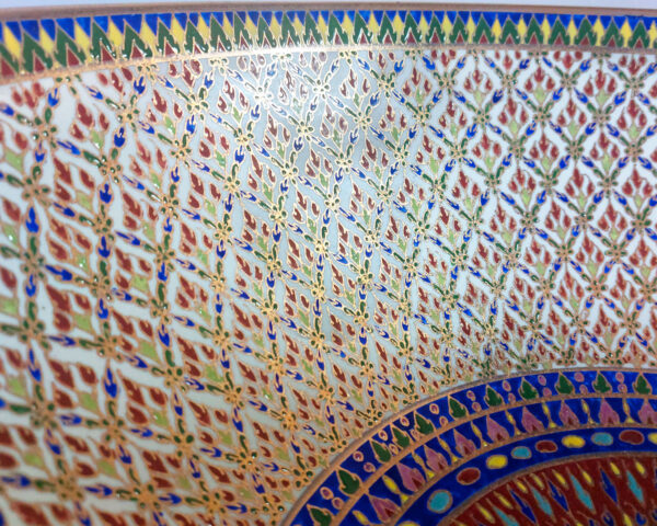 Close-up of Diamond Lattice’s golden embellishments, reflecting Thai artistic heritage.