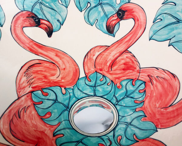 Close-up of Flamingo Dance ceramic sink, showcasing the vivid hand-painted details.