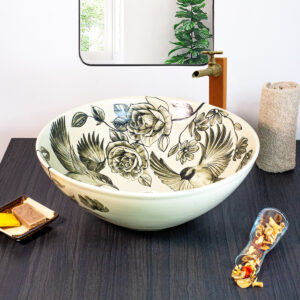 Black-and-white floral-patterned ceramic sink, perfect for adding timeless elegance to any bathroom.