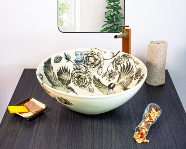 Black-and-white floral-patterned ceramic sink, perfect for adding timeless elegance to any bathroom.