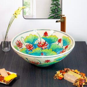 Tranquil ceramic sink inspired by the Thai lotus flower, featuring soft blue and coral hues.