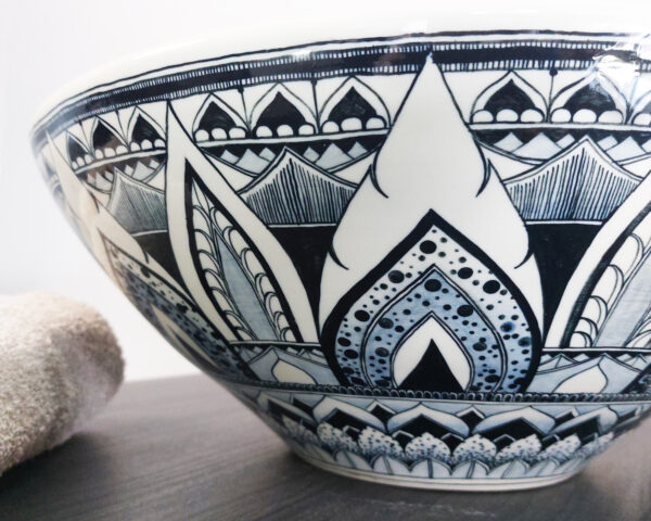 Side perspective of Mandala Bloom sink, emphasizing its elegant contours.