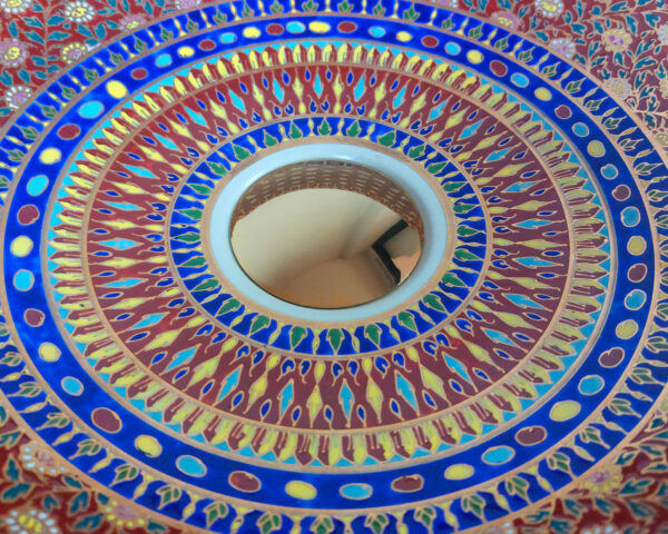 Close-up of Royal Garnet sink, highlighting the fine detailing and warm hues.