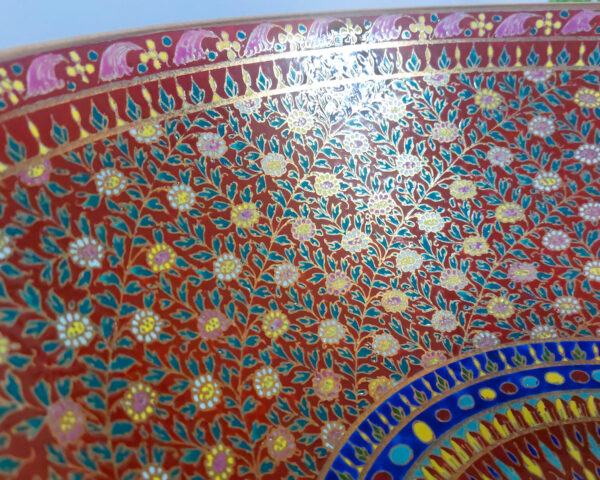 Close-up of Royal Garnet’s golden patterns, reflecting its luxurious craftsmanship.