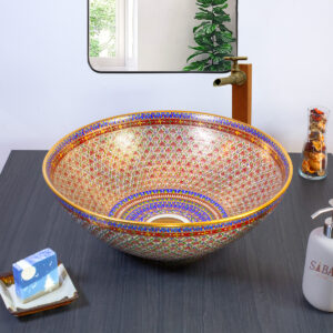 Traditional Thai ceramic sink with a mesmerizing red and gold geometric star pattern.