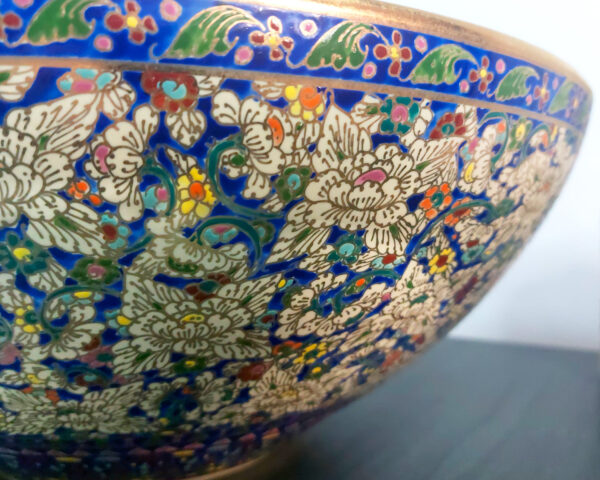 Side profile of Sapphire Bloom ceramic sink, showing its elegant curvature.