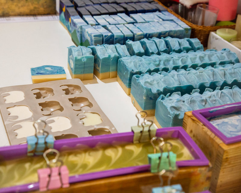 Handmade Soap Collection – Loaves, Batches, and Small Bars | Sabai Home A variety of handmade soaps, including large soap loaves, freshly cut batches, and small decorative bars, showcasing different shapes, textures, and colors.
