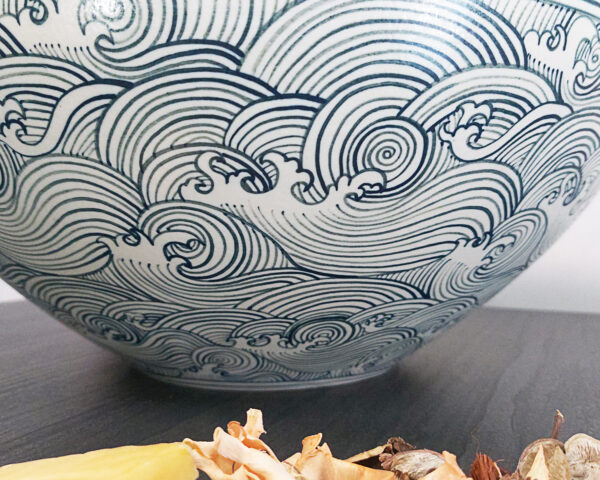 Side view of the Zen Breeze ceramic sink, emphasizing its smooth, rounded edges.