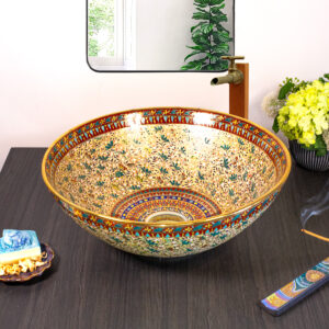 Front view of Celestial Mosaic ceramic basin with intricate floral and gold details.