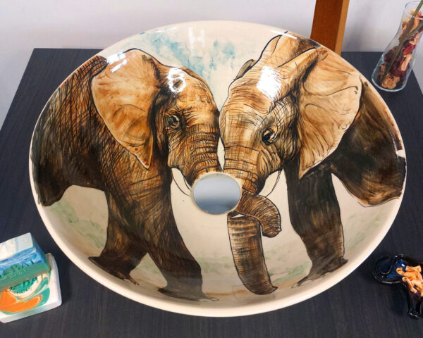 Top view showcasing symmetrical elephant design and foliage pattern.