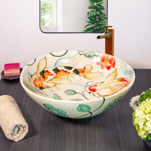 Front view of sink with koi fish swimming among lotus flowers.