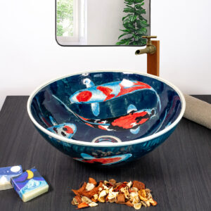Front view of koi fish ceramic basin with blue water motif