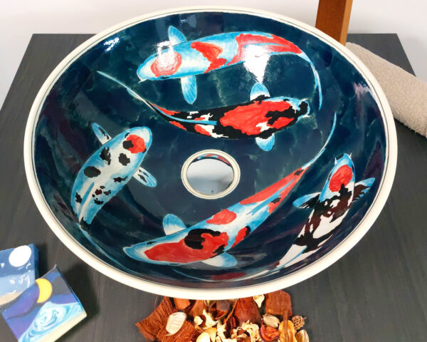 Overhead view of hand-painted koi fish design