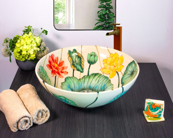 Front view of Lotus Reverie basin with colorful lotus flowers.