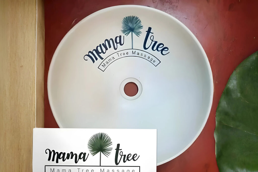 A white ceramic basin with a 'Mama Tree' logo, a custom branding example blending simplicity with elegance.