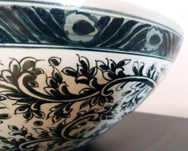 Side view of deep floral ceramic wash basin