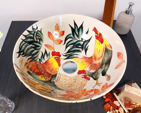 Overhead view of rooster-themed ceramic basin