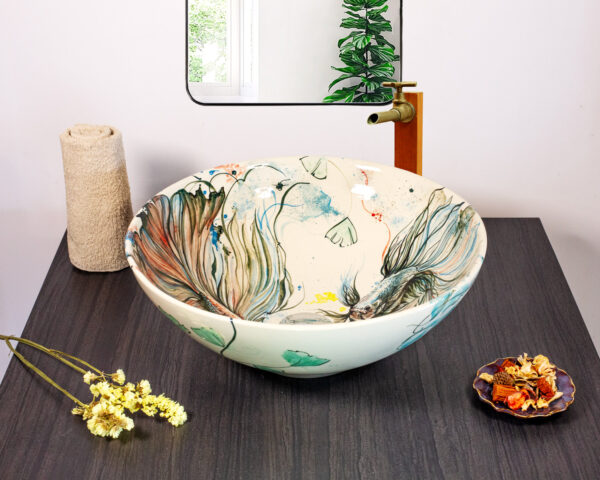 Front view of Ocean Fan basin with soft, flowing aquatic designs.