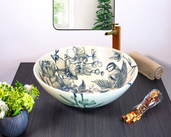 Front view of Orchid Whisper sink with hand painted blue orchids.