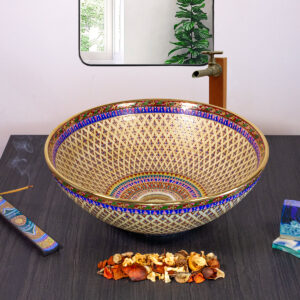 Front view of Royal Weave basin with gold mesh and blue border.