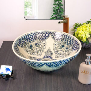 Handcrafted ceramic basin with traditional Thai mythical creatures on the front view
