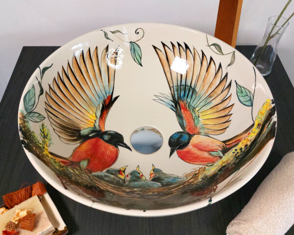 Top-down perspective of bird-themed ceramic basin