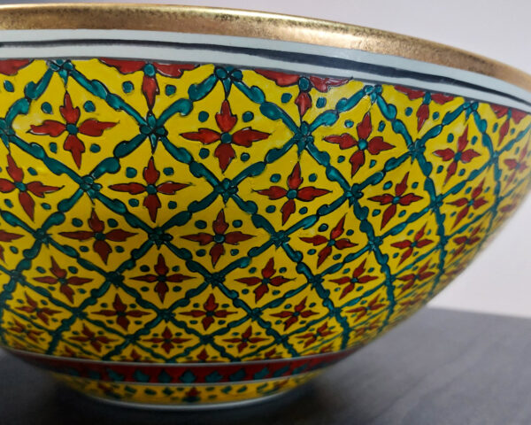 Side profile of Golden Harmony handmade ceramic basin, highlighting elegant shape and finish.