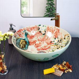 Hand painted Peacock Grace ceramic basin, front view of handmade Thai porcelain sink with peacock feather motifs.