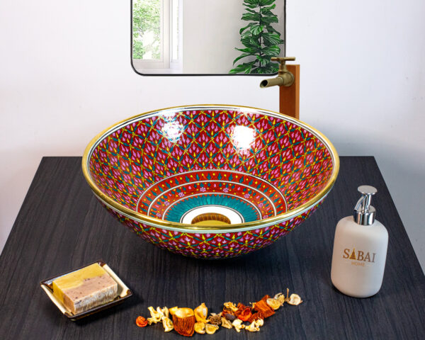 Side profile of Scarlet Bloom handmade ceramic basin, showing painted blooms and craftsmanship.
