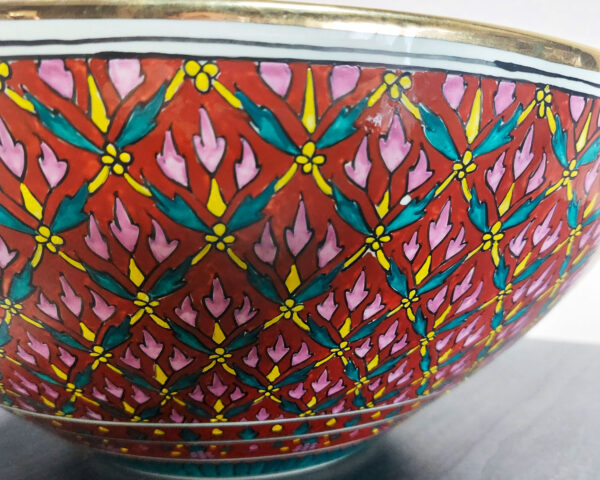 Side profile of Scarlet Bloom handmade ceramic basin, showing painted blooms and craftsmanship.