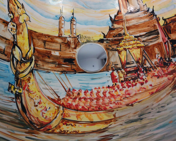 Close up of Thai Royal Boats hand painted ceramic basin, intricate Thai porcelain detail of barges and ornament.