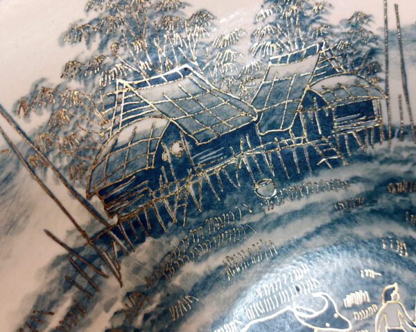 Close up details of Traditional Houses hand painted ceramic basin, fine Thai porcelain architectural detail.